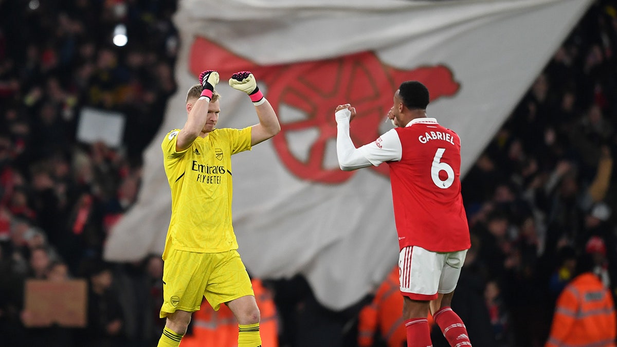 Ramsdale and Gabriel celebrate after Arsenal win