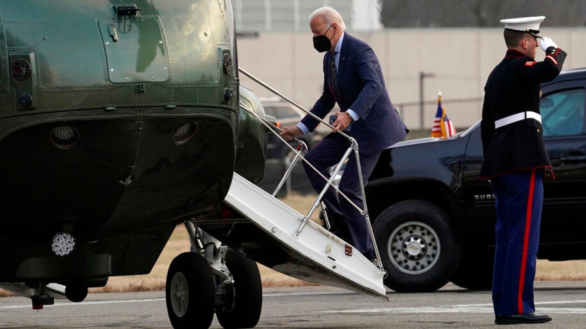 President Joe Biden boards Marine One