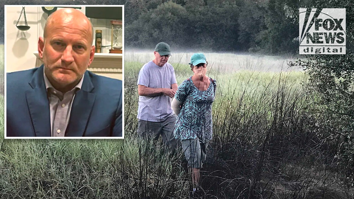 Laundrie parents walk through swamp