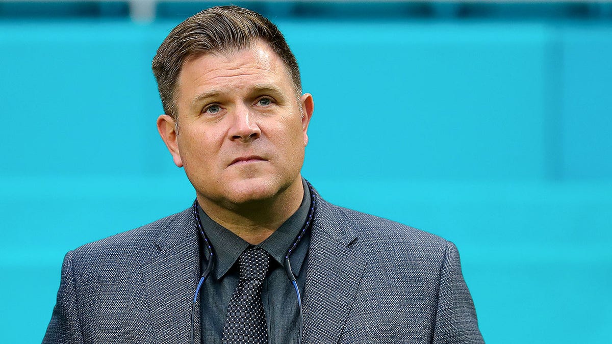 Packers general manager Brian Gutekunst looks on prior to a game