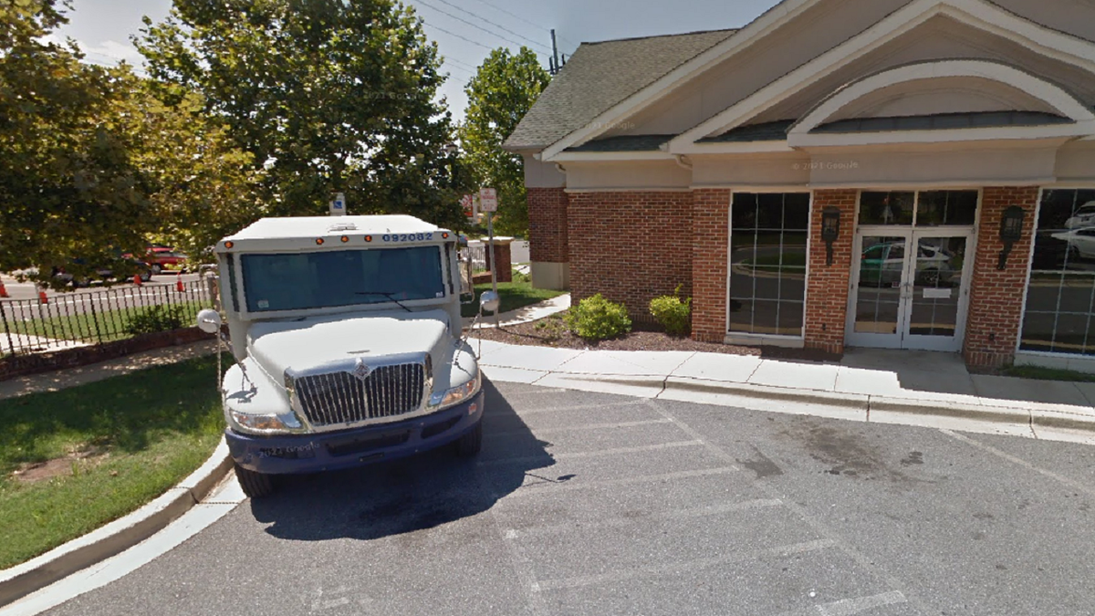 Brinks armored truck outside of Truist Bank