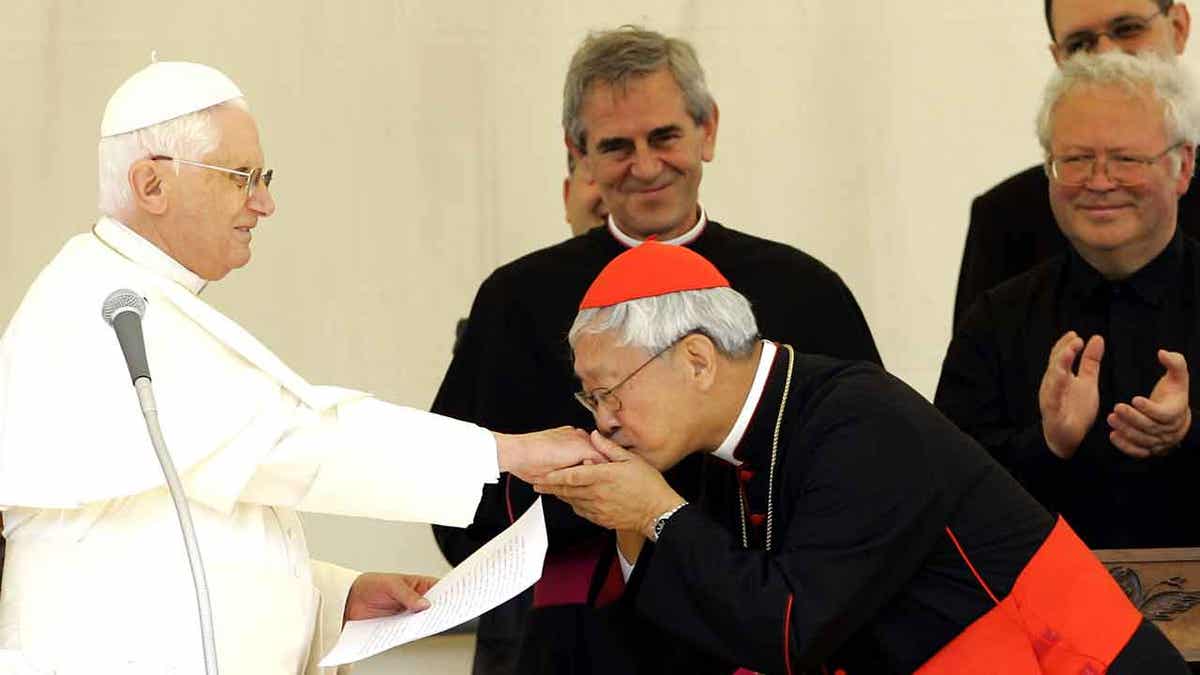 Cardinal Zen kisses Pope Benedicts' hand