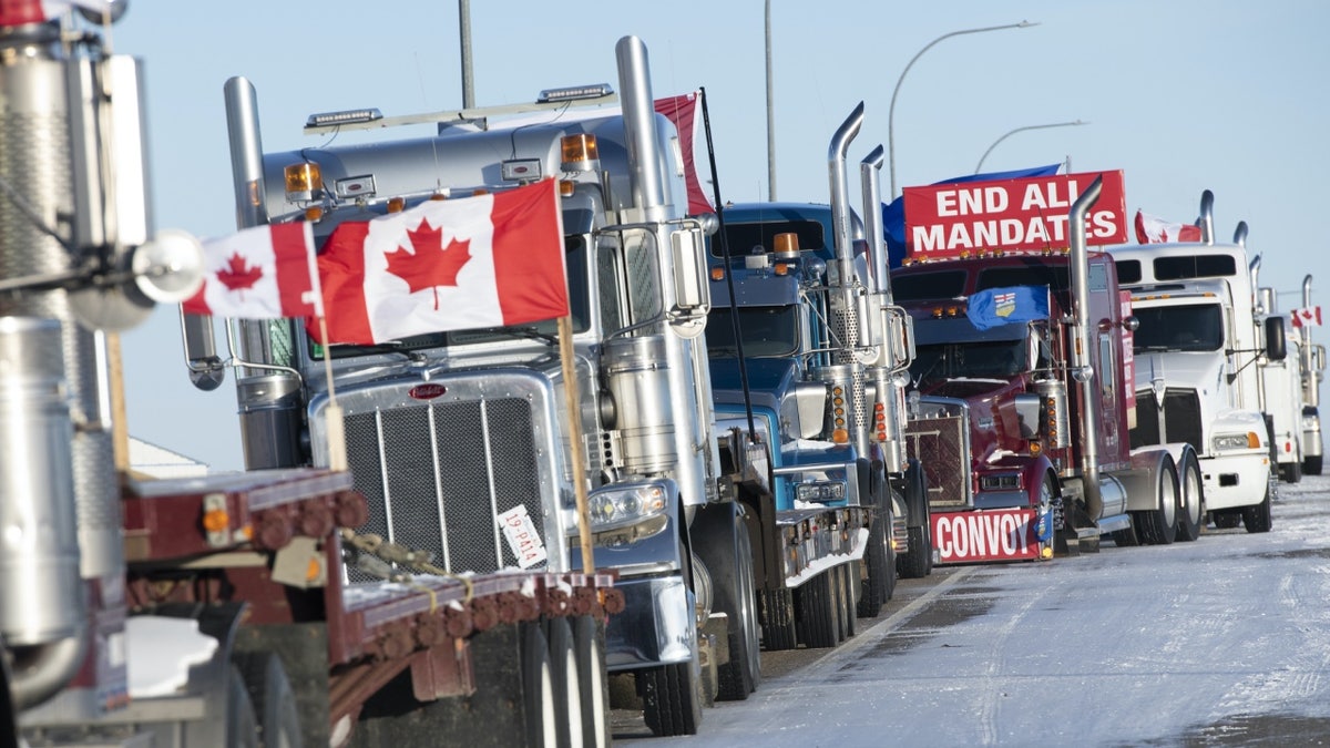 Line of trucks block the U.S.-Canada border in Coutts