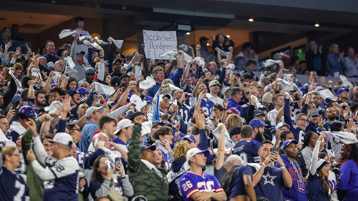 Cowboys fans watching their team