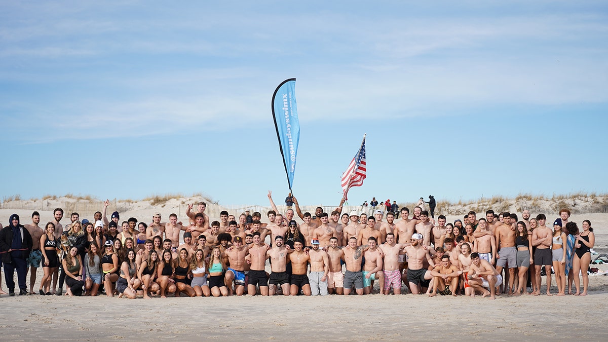 sunday swim people on beach