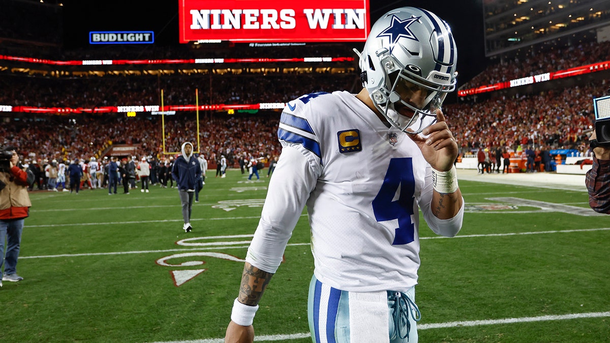 Dak Prescott walks off the field