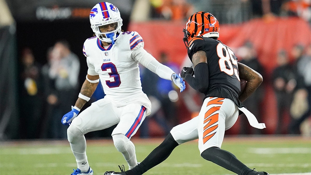 Buffalo Bills safety Damar Hamlin prepares to tackle Bengals receiver