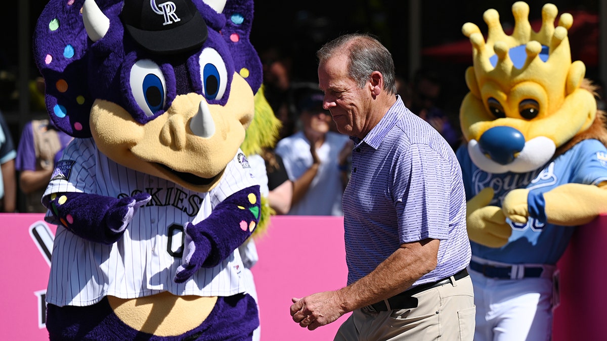 Dick Monfort and the Rockies mascots