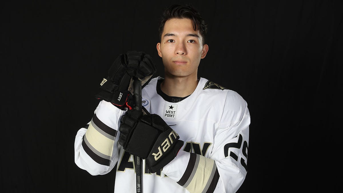 Eric Huss of Army hockey poses for a picture