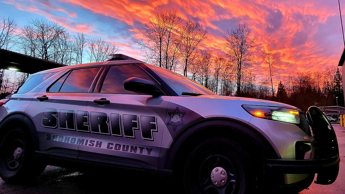 A police vehicle as sunset