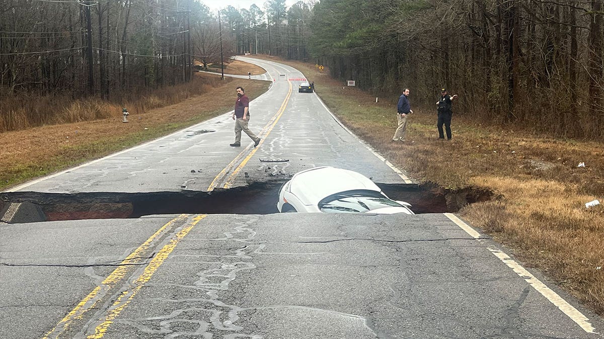Georgia road swallows vehicle
