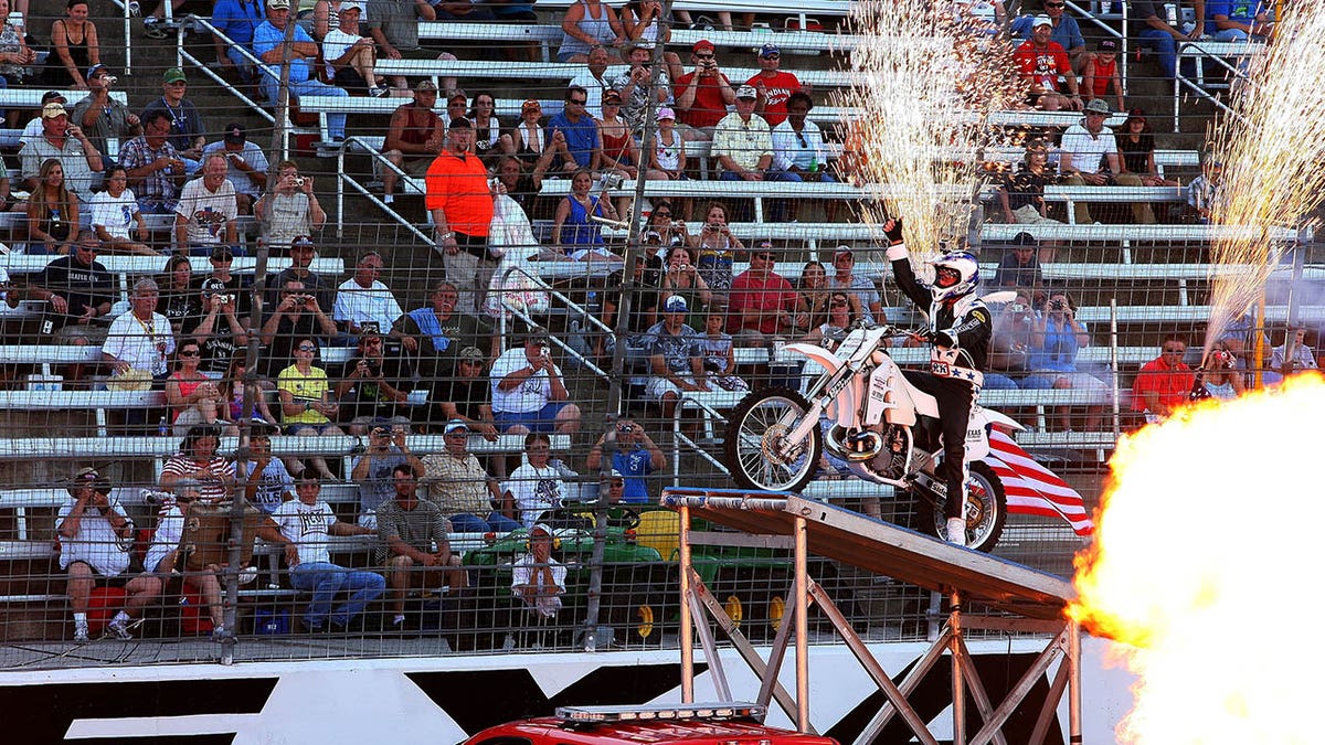 Robbie Knievel engages with the crowd before a jump in 2010.