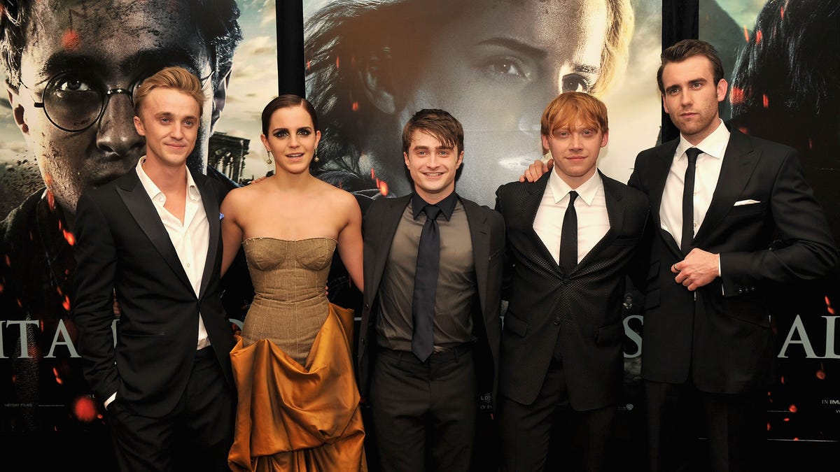 L to R: Tom Felton, Emma Watson, Daniel Radcliffe, Rupert Grint, and Matthew Lewis pose together for the premiere of Harry Potter and the Deathly Hallows Part 2 