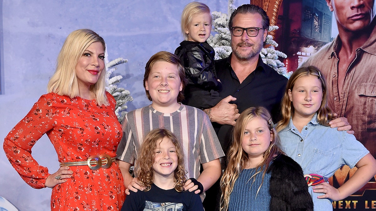 Tori Spelling and her family at the premiere of "Jumanji"