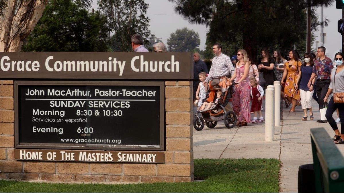 Grace Community Church parishioners make their way to Sunday service in Sun Valley on Sept. 13, 2020. 