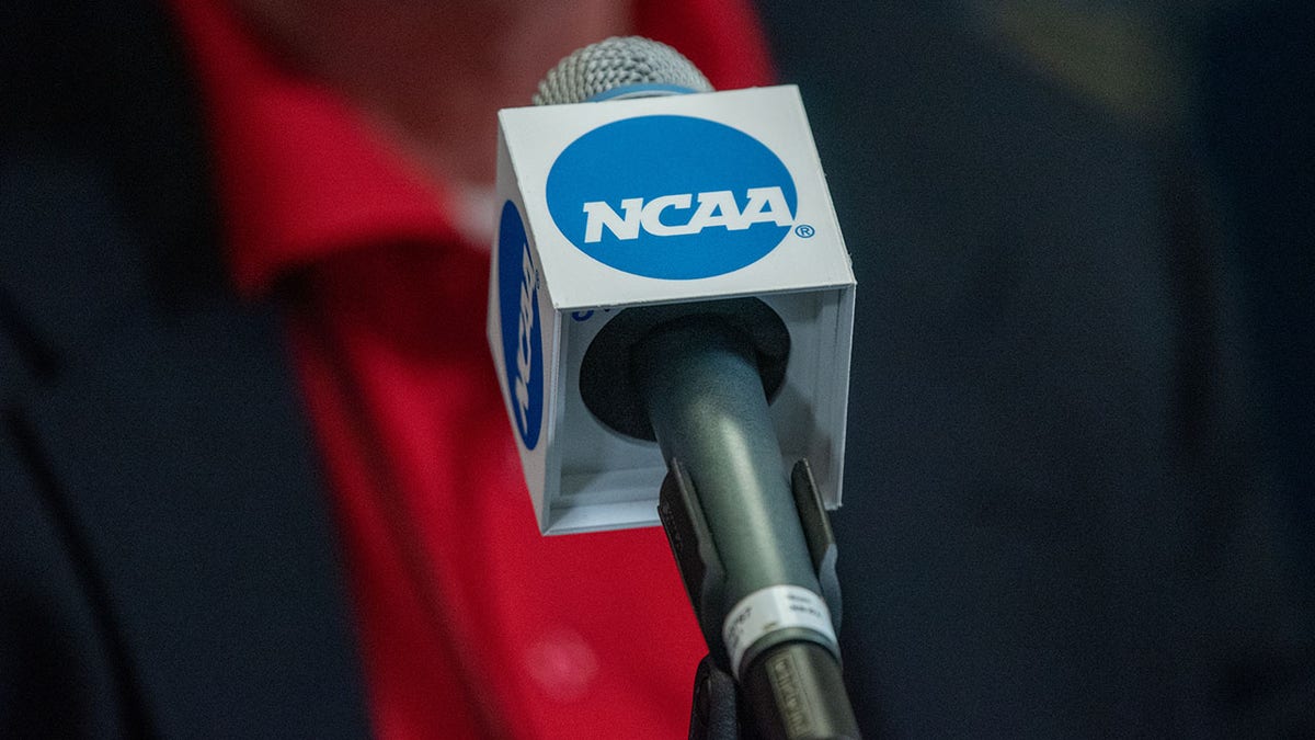 A picture of the NCAA logo on a microphone