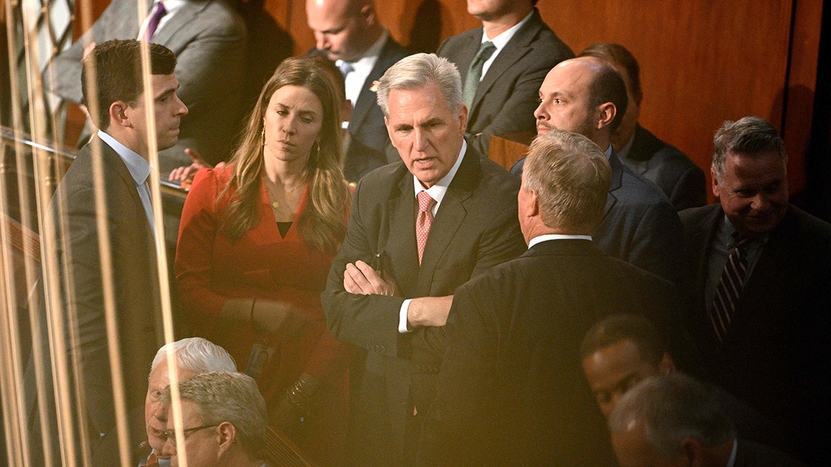 McCarthy on house floor with other representatives
