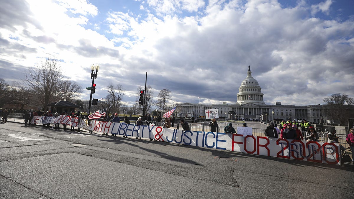 Capitol with protest signs