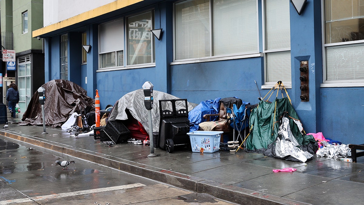 Tents and items on the side of the street