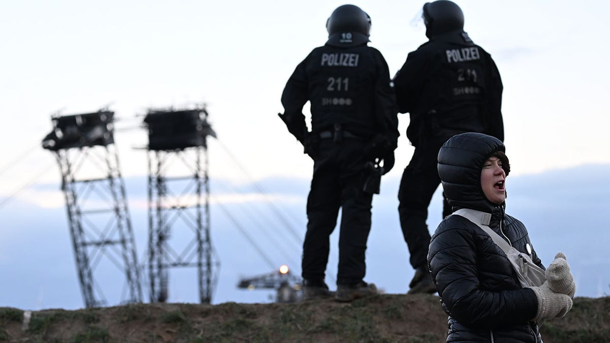German police by Greta Thunberg