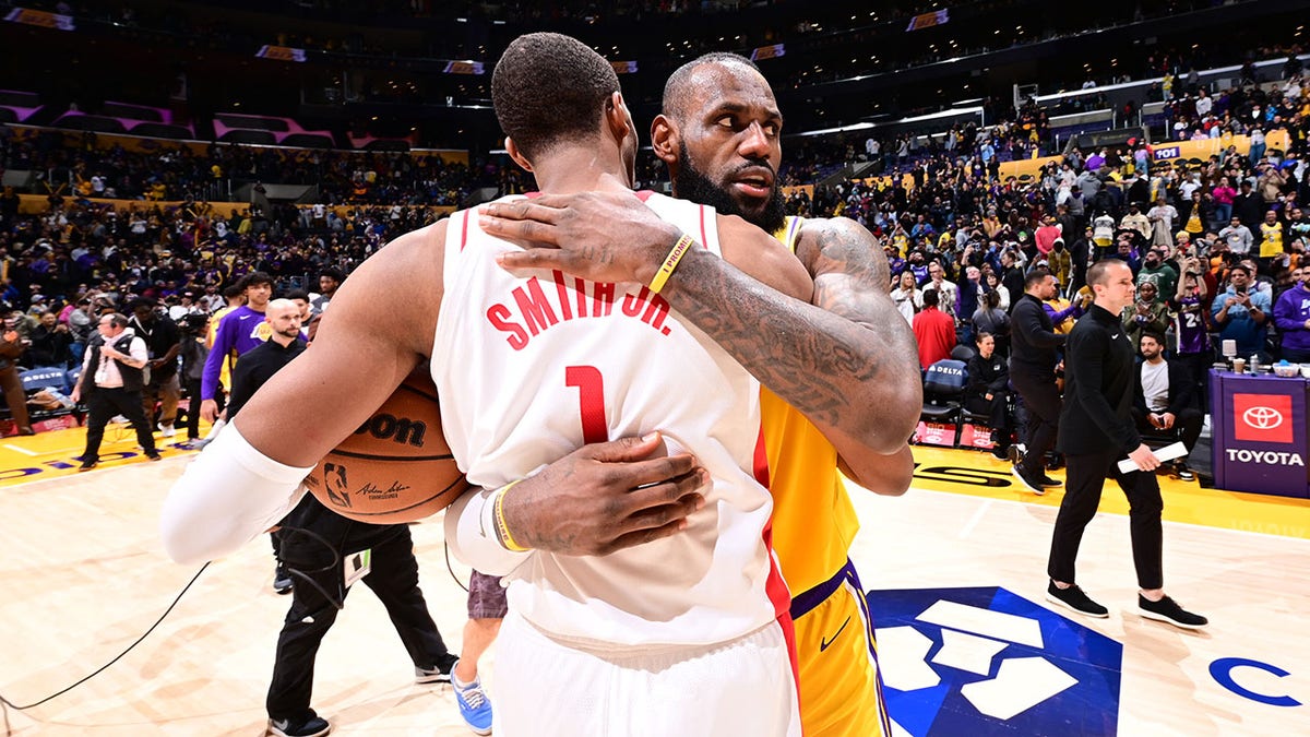 Jabari Smith Jr. and LeBron James embrace