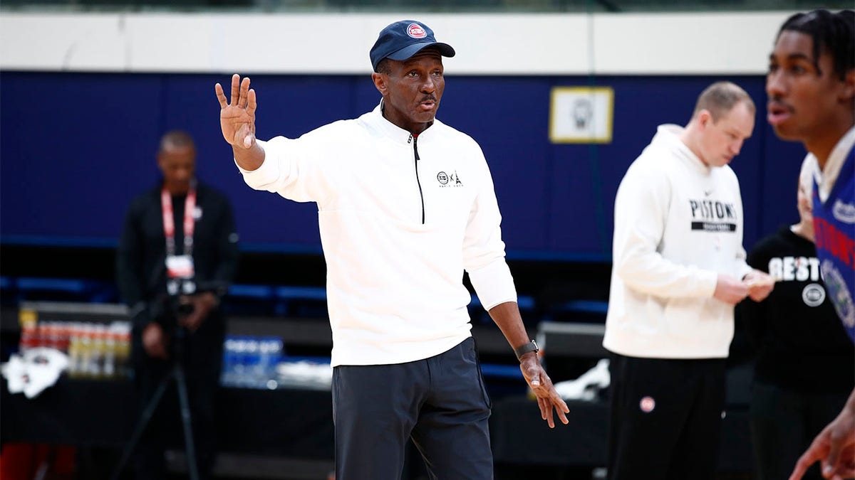 Dwane Casey coaches his team at practice