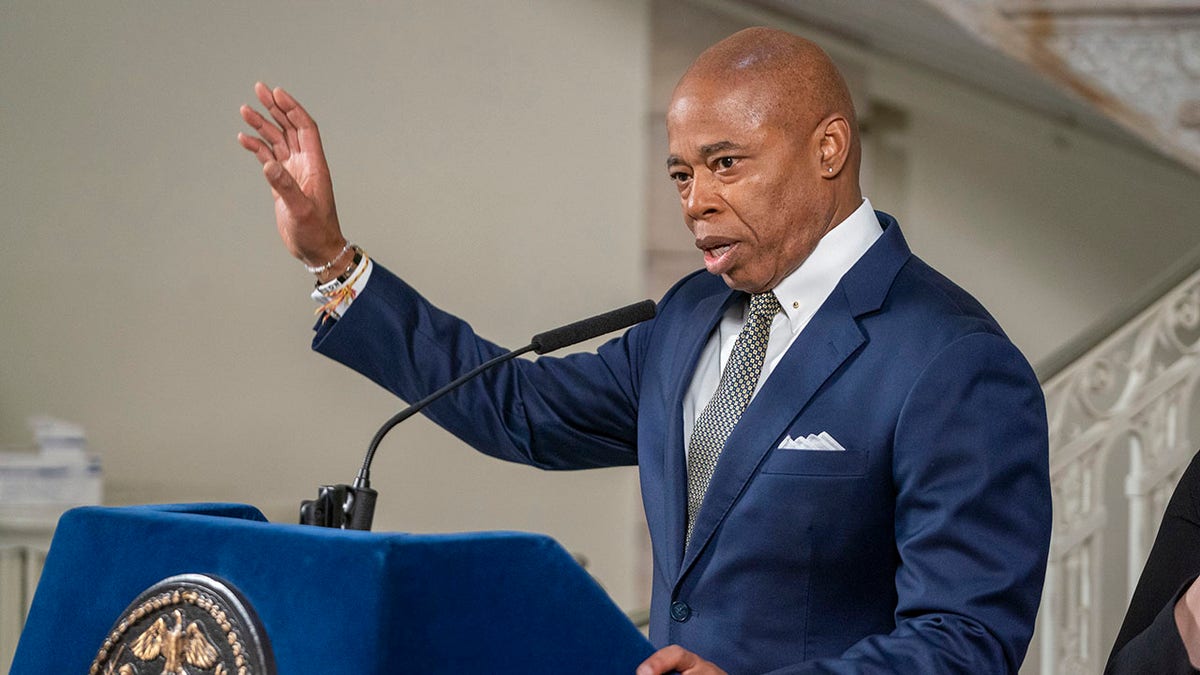 Mayor Eric Adams, D-NYC, at microphone