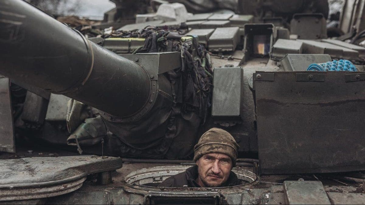Ukraine soldier in a tank