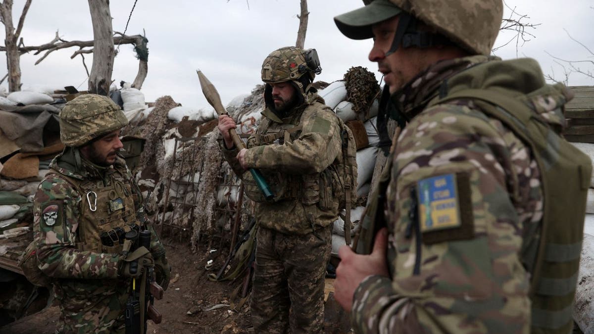 Russian, Ukrainian officers say dozens of infantrymen have been freed in prisoner swap