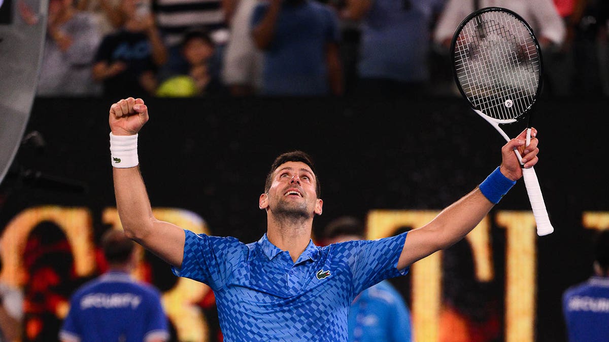 Novak Djokovic celebrates advancing to the Australian Open Final