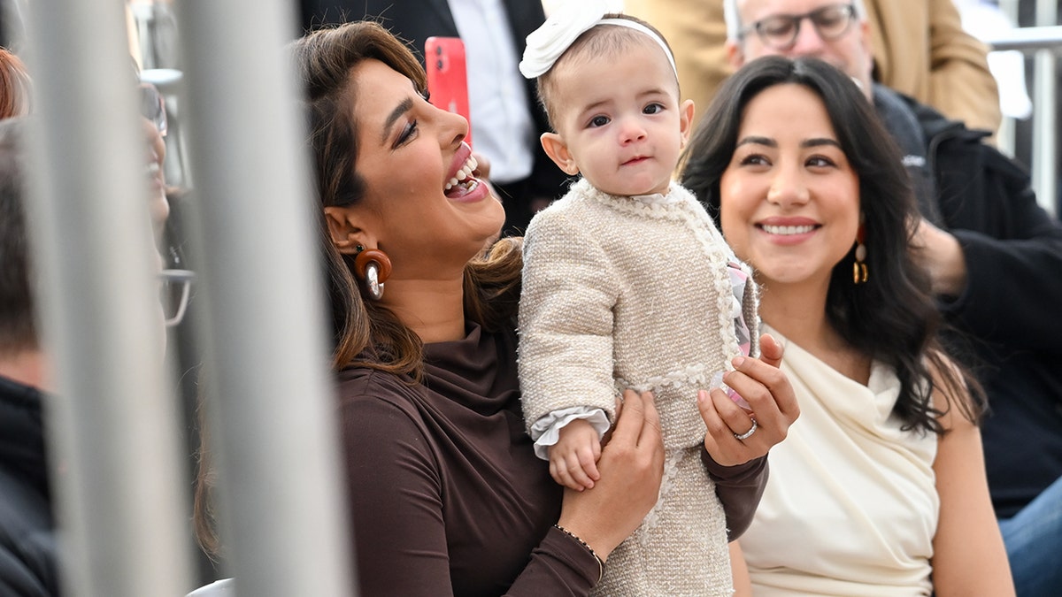 Priyanka Chopra and Malti Marie in the audience