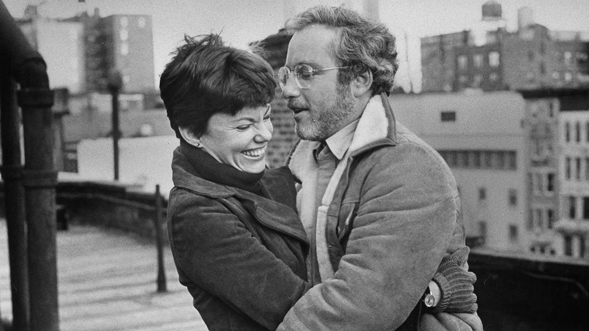 Marsha Maron smiles in a black and white photo as she is held by Richard Dreyfuss in a scene for the movie "The Goodbye Girl"
