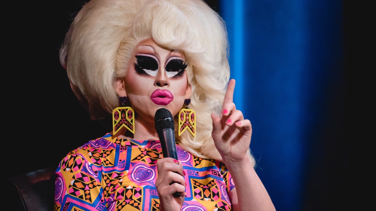 Drag Queen Trixie Mattel, holding microphone, talking