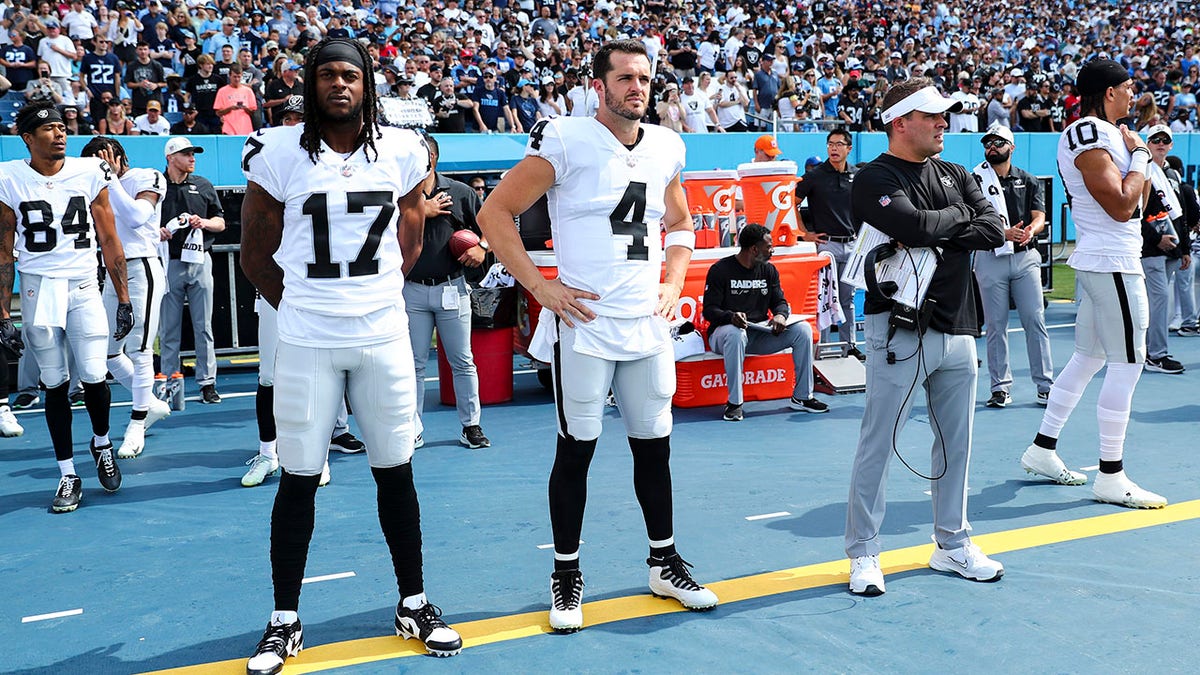 Davante Adams and Derek Carr on the sidelines