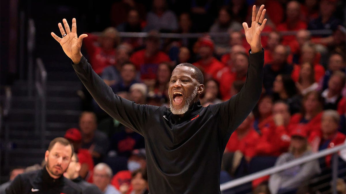 Anthony Grant directs his Dayton Flyers