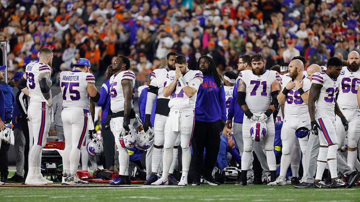 Buffalo Bills react following Damar Hamlin's collapse onto the field