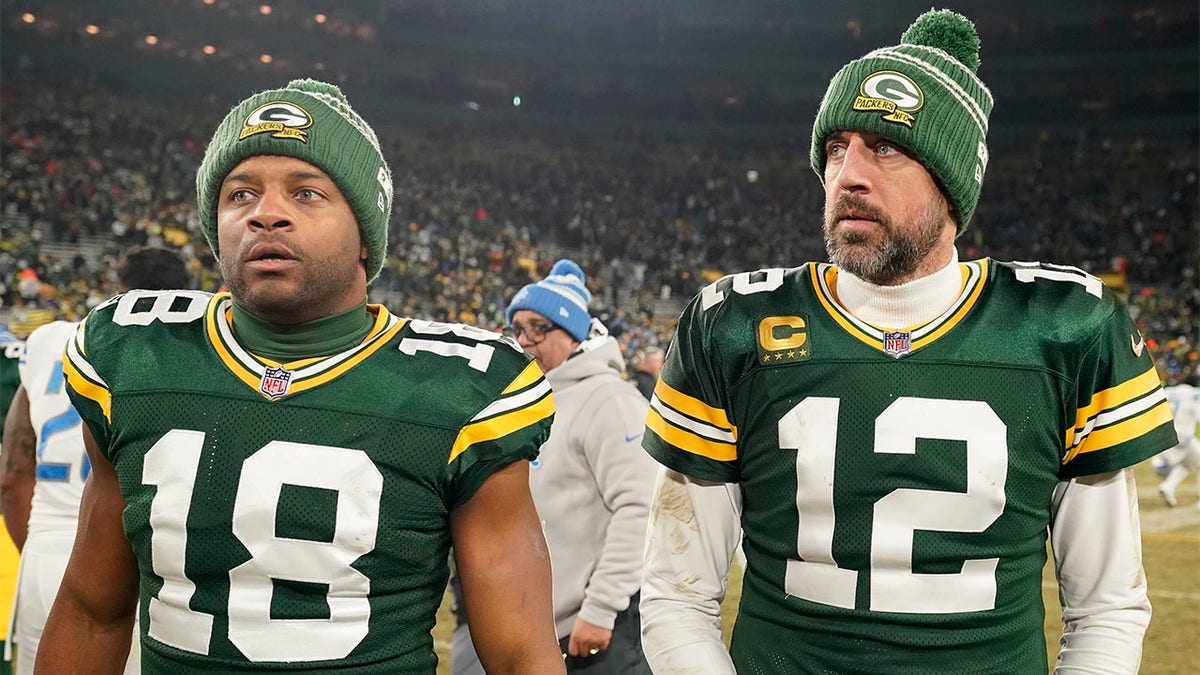 Aaron Rodgers and Randall Cobb after losing in the playoffs