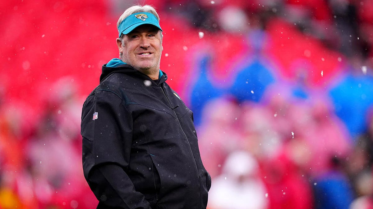 Doug Pederson stands during warm ups