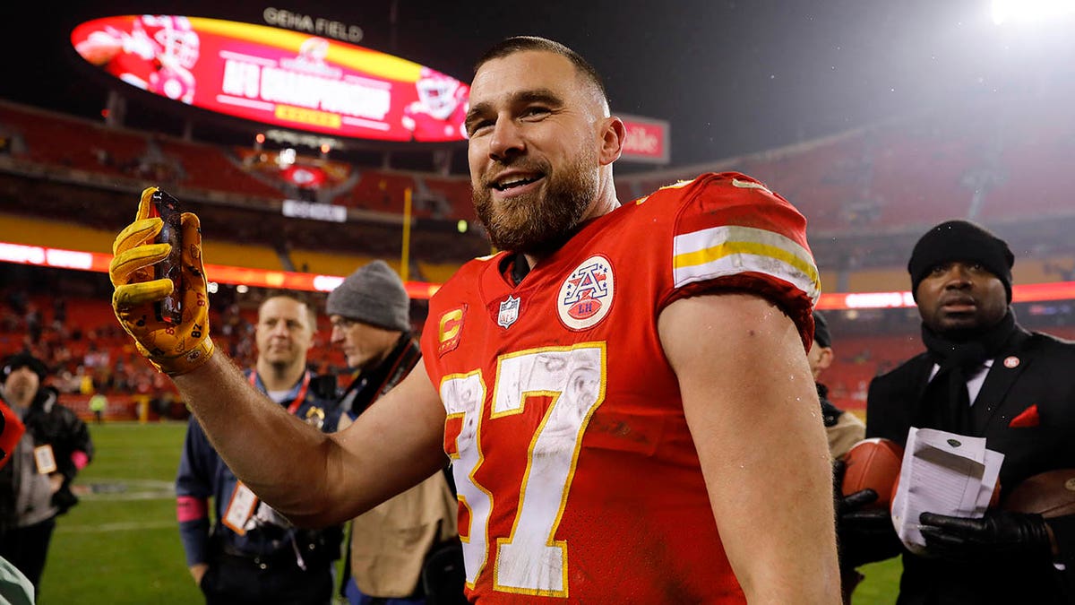 Travis Kelce celebrates after defeating the Jacksonville Jaguars