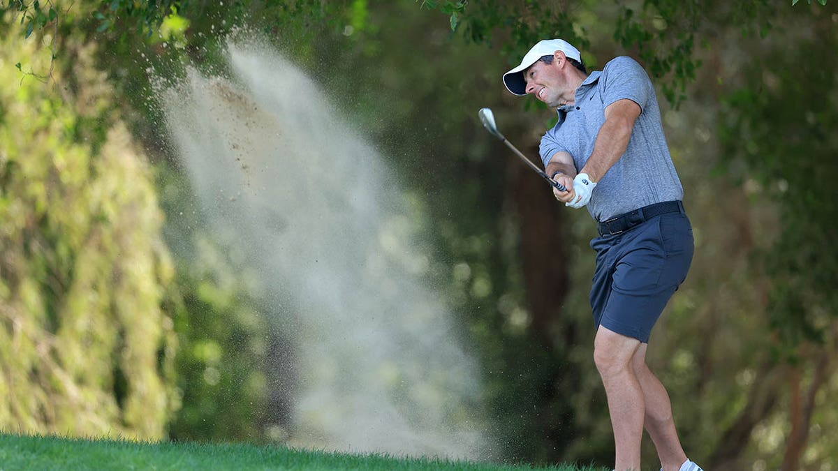 Rory McIlroy plays during a practice round in Dubai