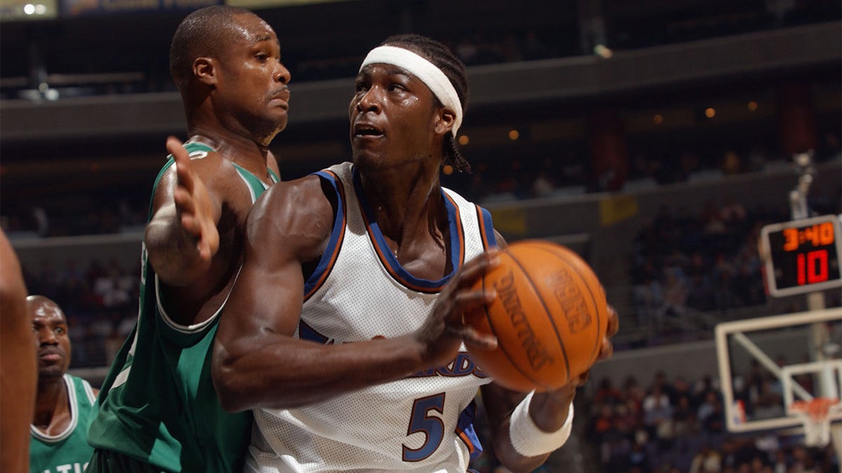 Kwame Brown plays against the Celtics in 2002
