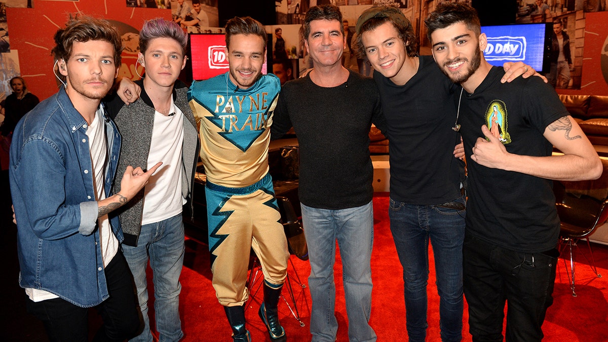 One Direction with Simon Cowell