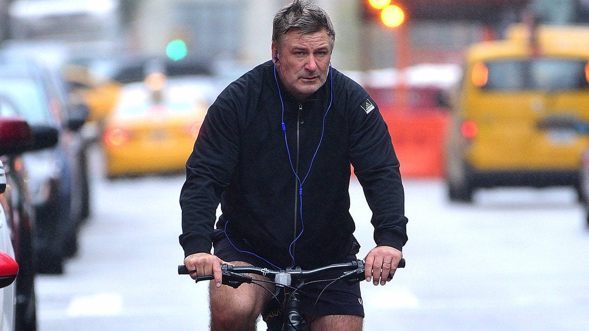 Alec Baldwin riding his bike