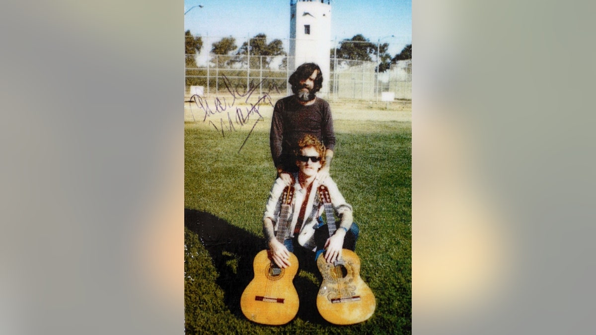 Signed photo of Charles Manson and Eddie Ragsdale