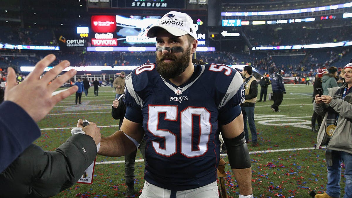 Rob Ninkovich walks off the field after an AFC title game