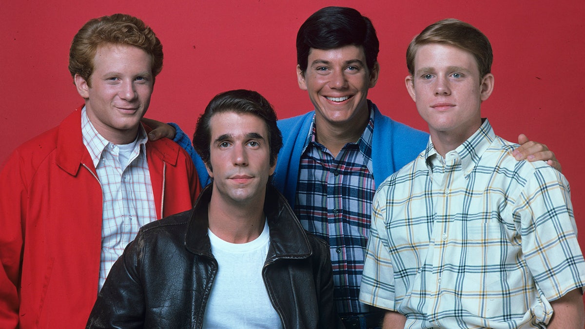 Fonzie (Henry Winkler), Richie (Ron Howard), Potsie (Anson WIlliams) and Ralph (Don Most) in a picture from season 2 of "Happy Days" with all men but Fonzie wearing plaid shirts