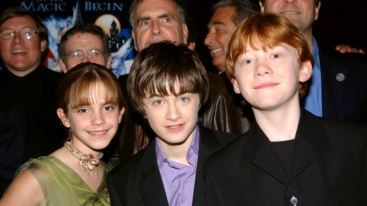 L to R Emma Watson, Daniel Radcliffe and Rupert Grint at the premiere of Harry Potter and the Sorcerer's Stone