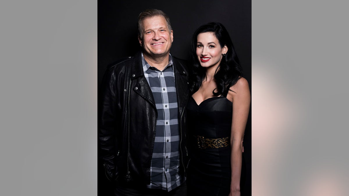 Drew Carey and Amie Harwick smiling together