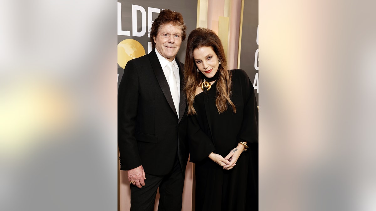 Jerry Schilling and Lisa Marie Presley at the Golden Globes