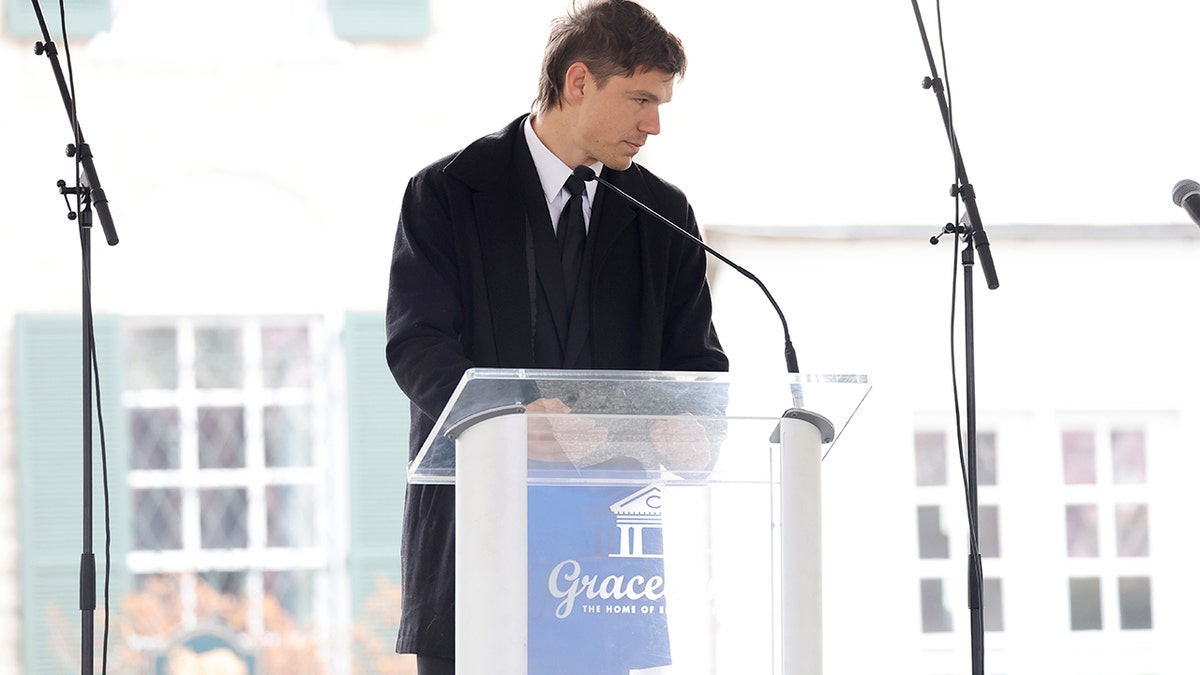 Ben Smith-Petersen reading a letter from Riley Keough